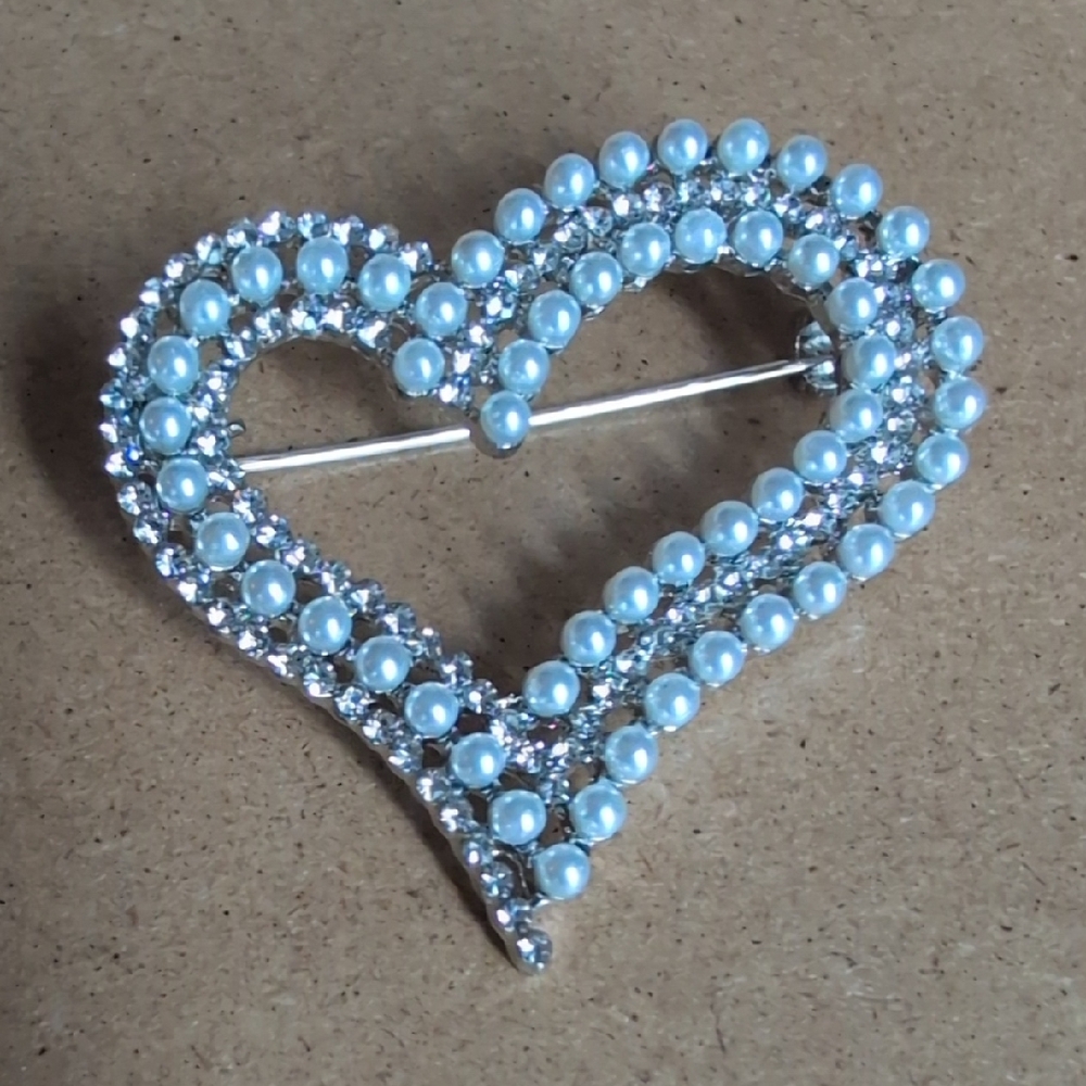 Elegant Silver and Heart Brooch